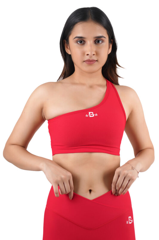 One shoulder sports bra is a stylish and unique activewear piece designed for you. It features a single strap that goes over one shoulder, creating an asymmetrical design. This type of sports bra offers a fashionable twist to traditional sports bras,